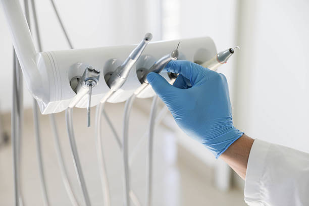 Professional Tooth Extraction technician working in Plainfield, IN
